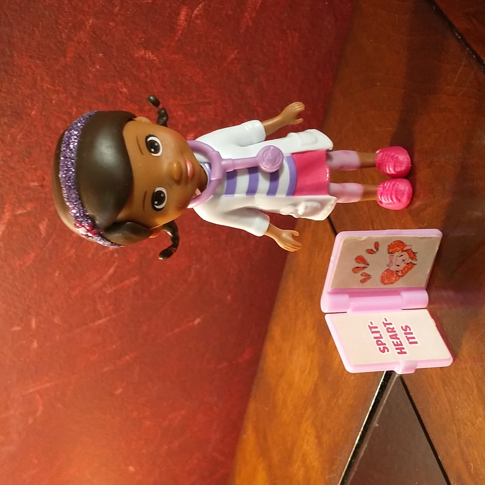 Doc McStuffins Doll Approximately 3.5"T w/A Stethoscope, Heart Book and Shoes